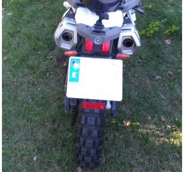 Soporte de catadióptrico para matricula o guardabarros